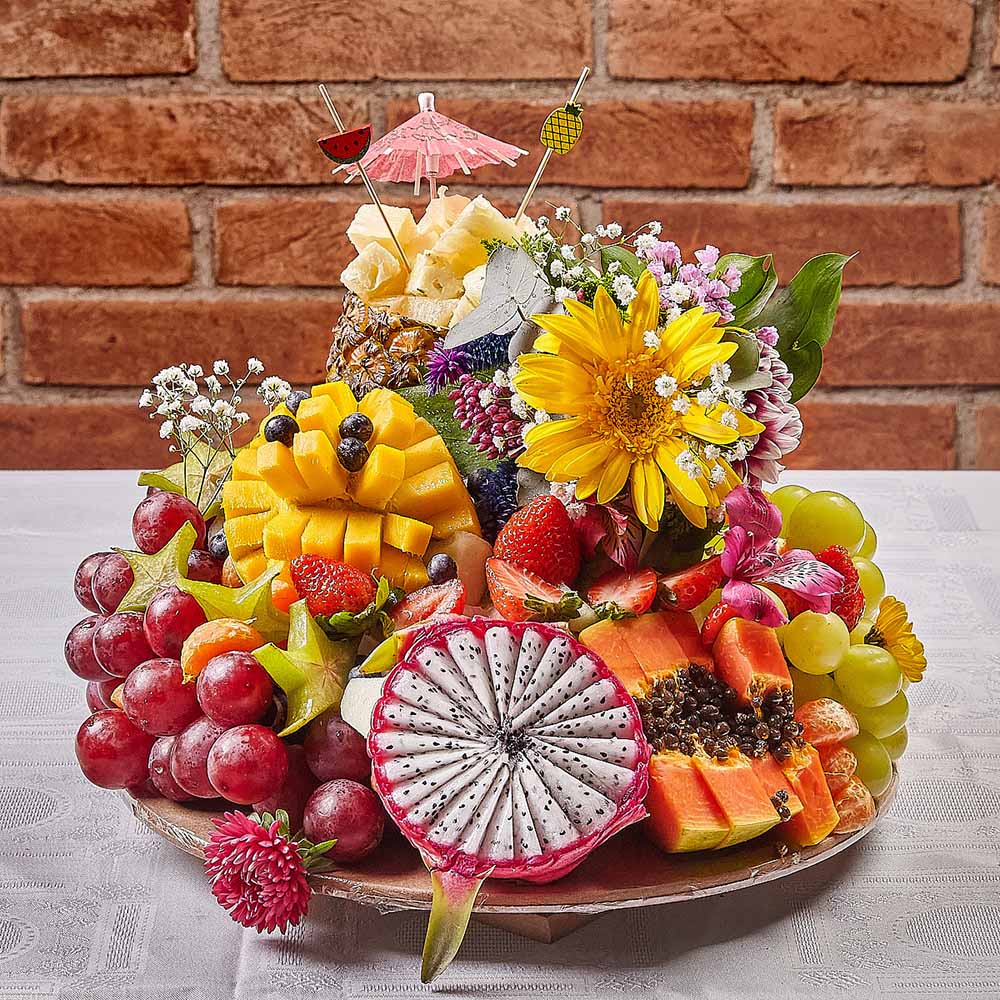 decoração de mesa com frutas e flores