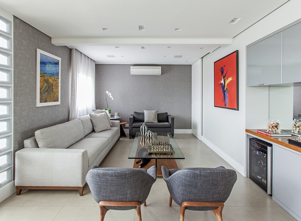 decoração de sala com sofa retratil e poltronas