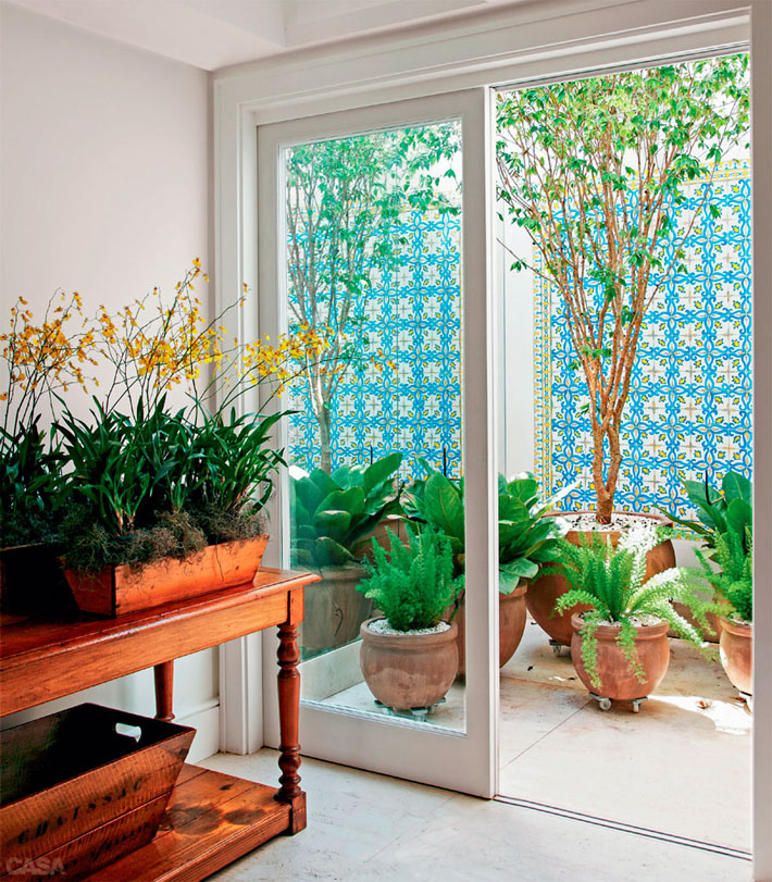 Guia completo de iluminação para jardins de inverno