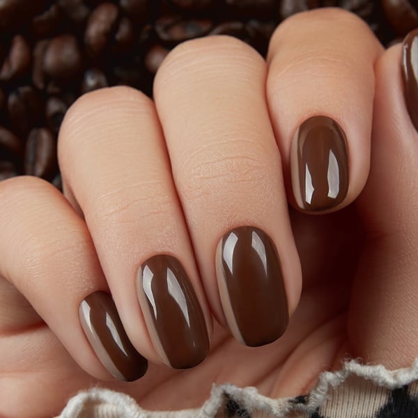 unhas marrons escuras manchadas o que pode ser